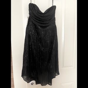 Strapless semi formal dress.